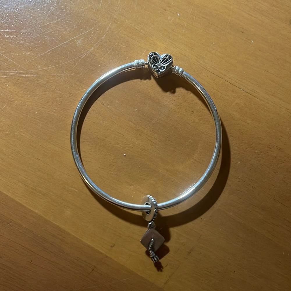 Retired pandora bangle and grad cap charm